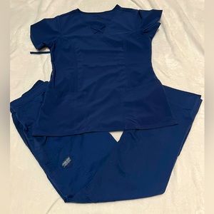 Navy blue. Small top. Tall small pants. Two different brands — similar color